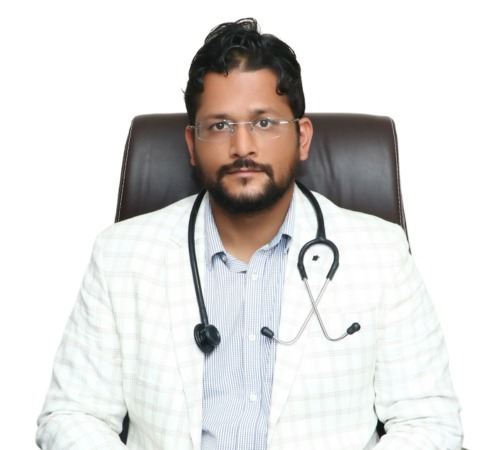 Dr. Sunil Bhatt consulting a patient at Panacea Hospital, Rishikesh for general medical care